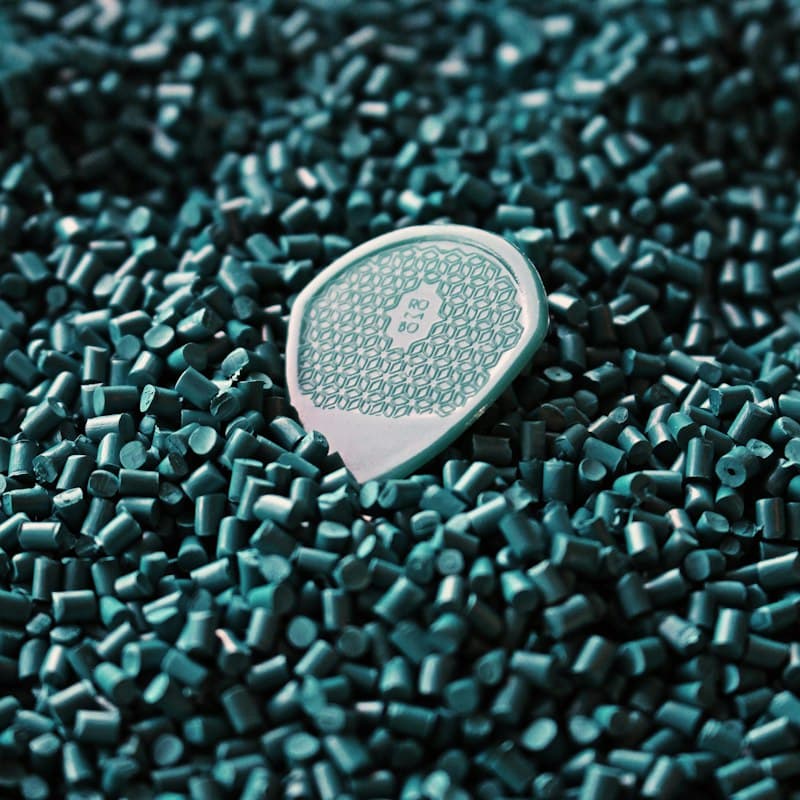 Dark polymer granules close up