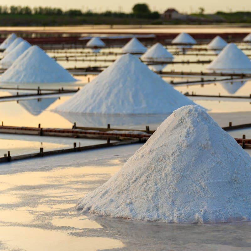 Heaps of sea salt in salt pans