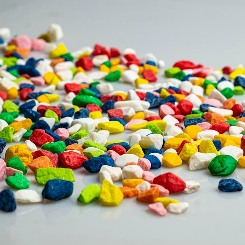 Coloured polymer granules